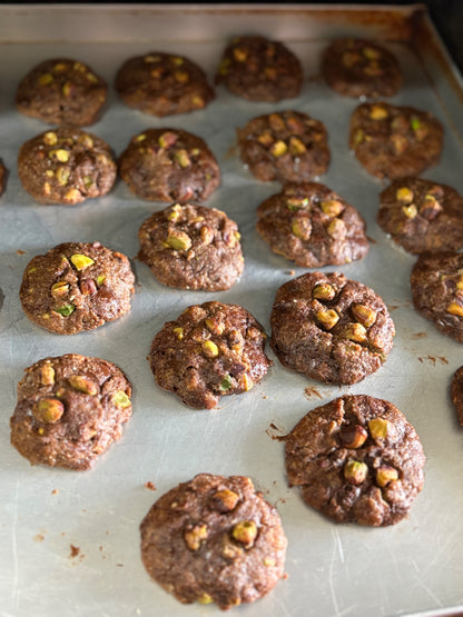 Baked cookies with nuts on a baking sheet